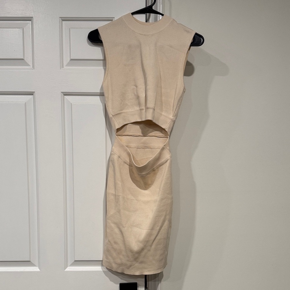 dress new in bag- gives appearance of skirt and top in front, dress in back